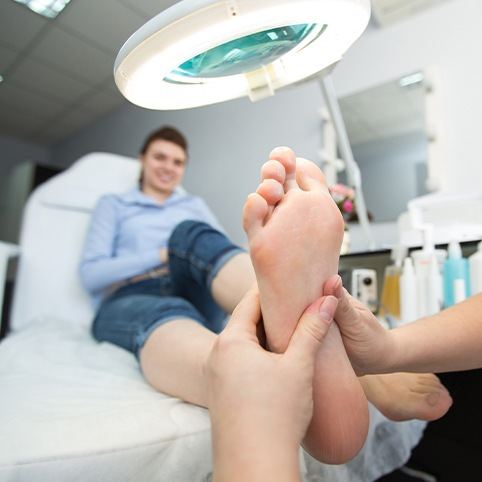 Doctor examining patient's foot