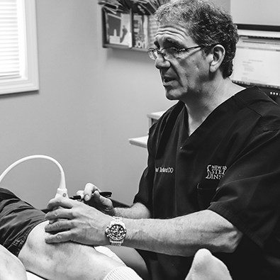 Dr. Tortland using ultrasound system