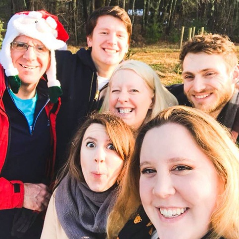 Family smiling outdoors