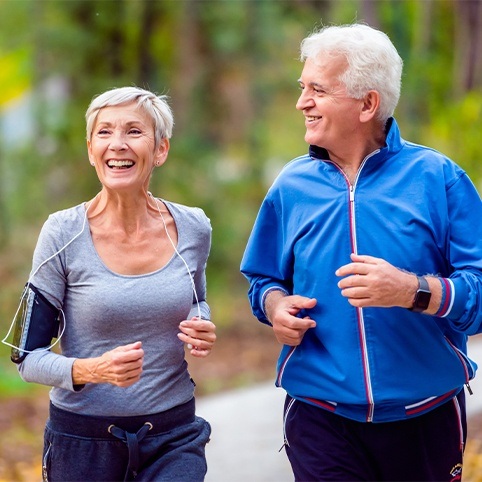 Man and woman jogging after woman received treatment for labral tears