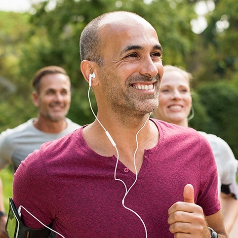 Man enjoying a jog after plantar fasciitis treatment