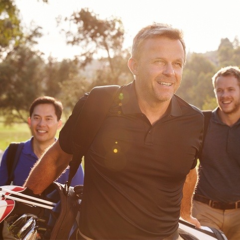 Man enjoying a day golfing thanks to regenerative medicine