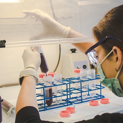 Team member placing blood into plasma seperator