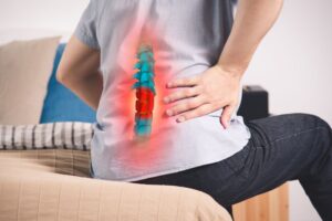 Man experiencing low back pain